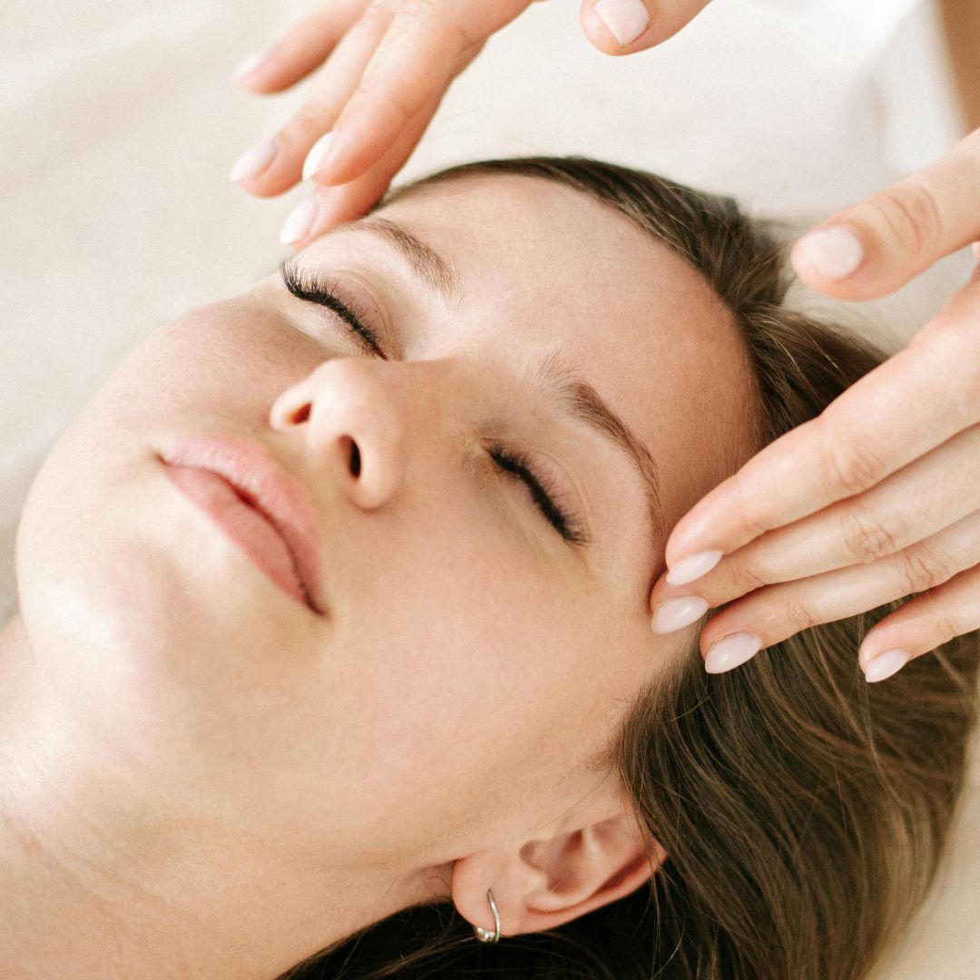 photo of someone getting a head massage